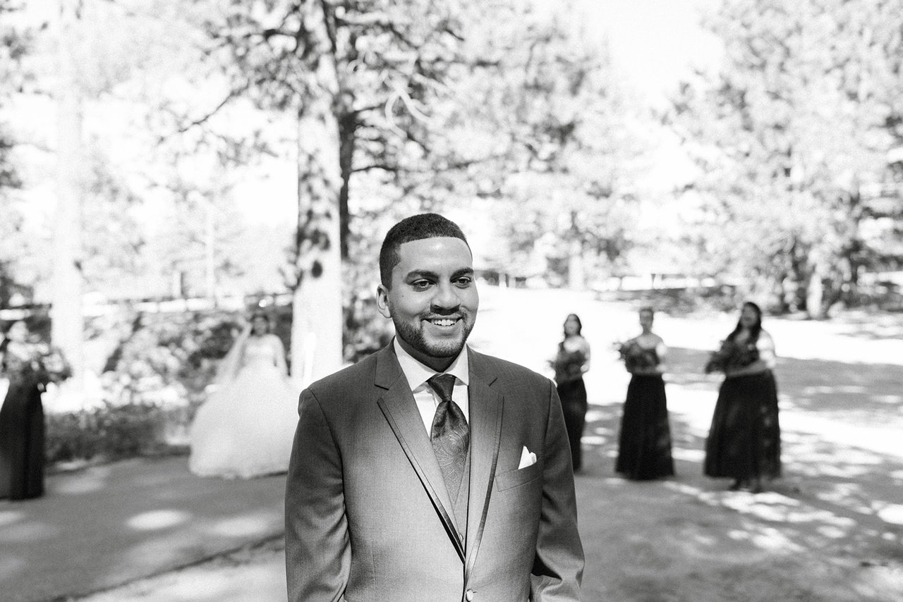 Jason grins as he waits for the first look, in black and white