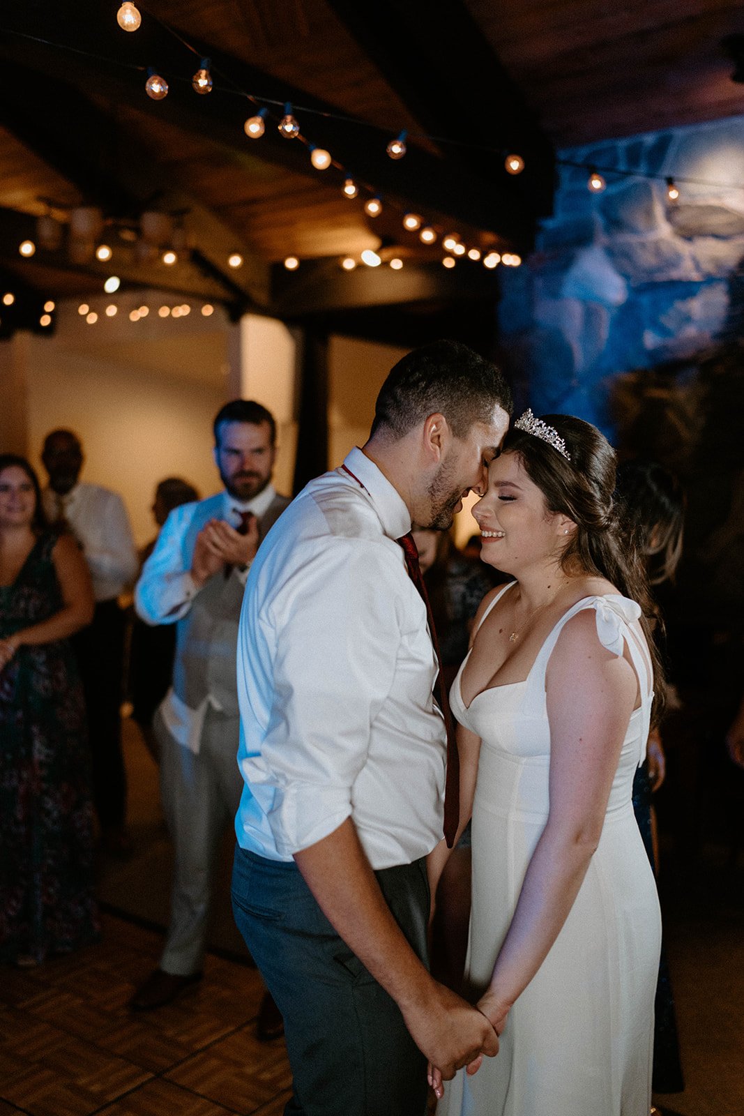 Montse and Jason face each other on the dance floor