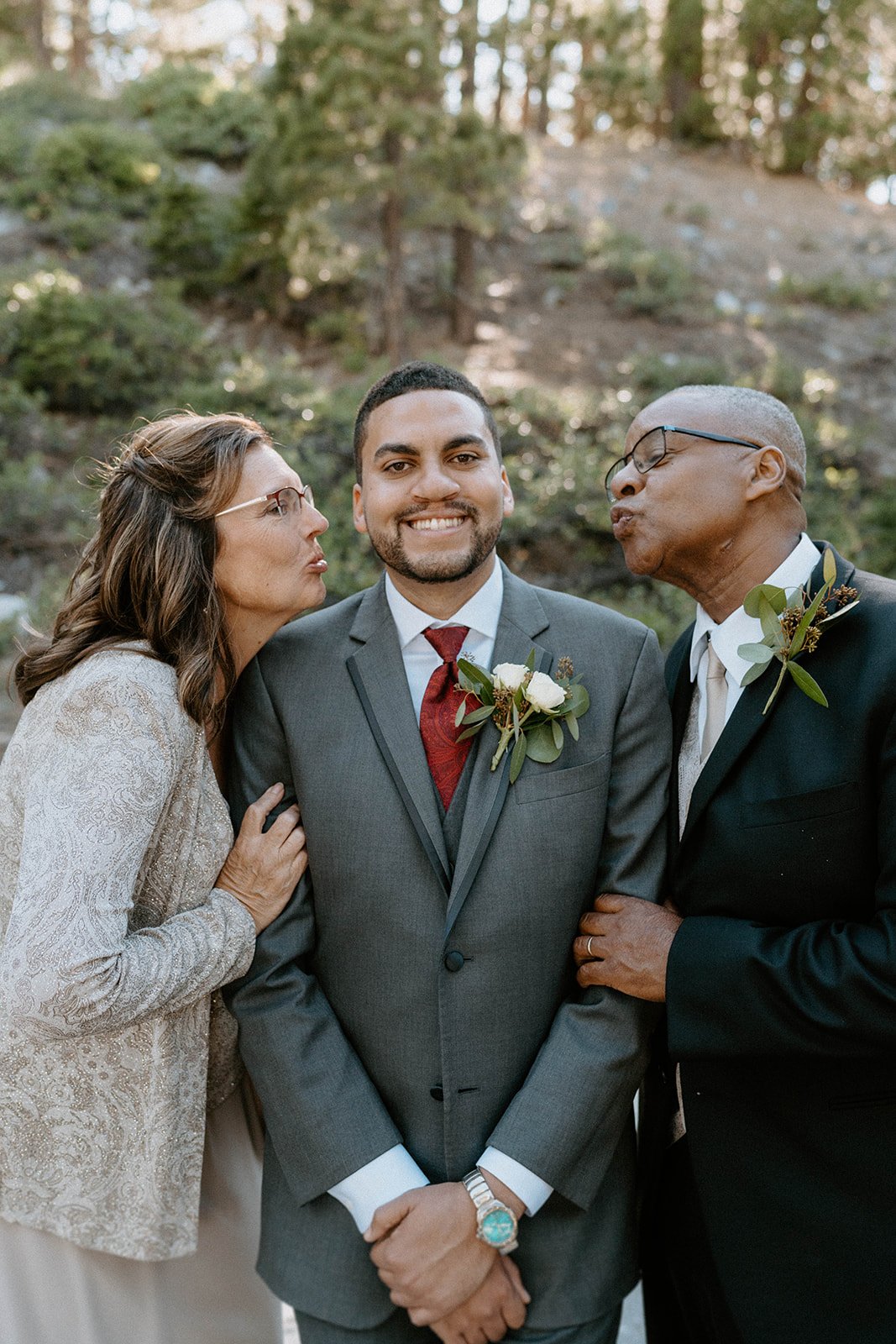 Two loved ones kiss Jason's cheeks at the same time