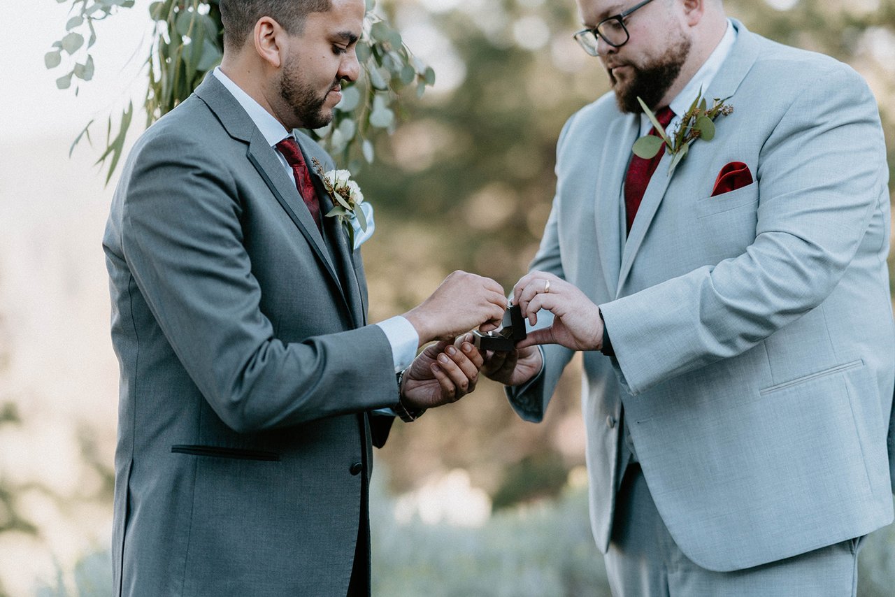 The best man hands over the rings