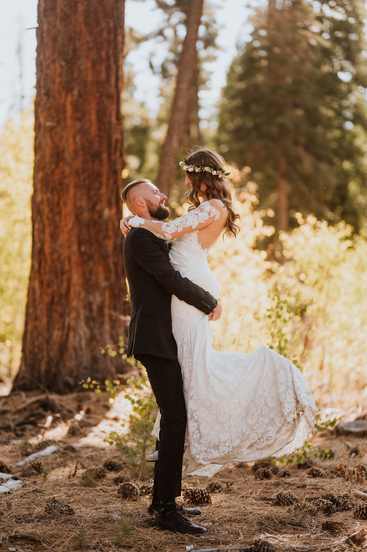 Christopher lifts Rachel off her feet