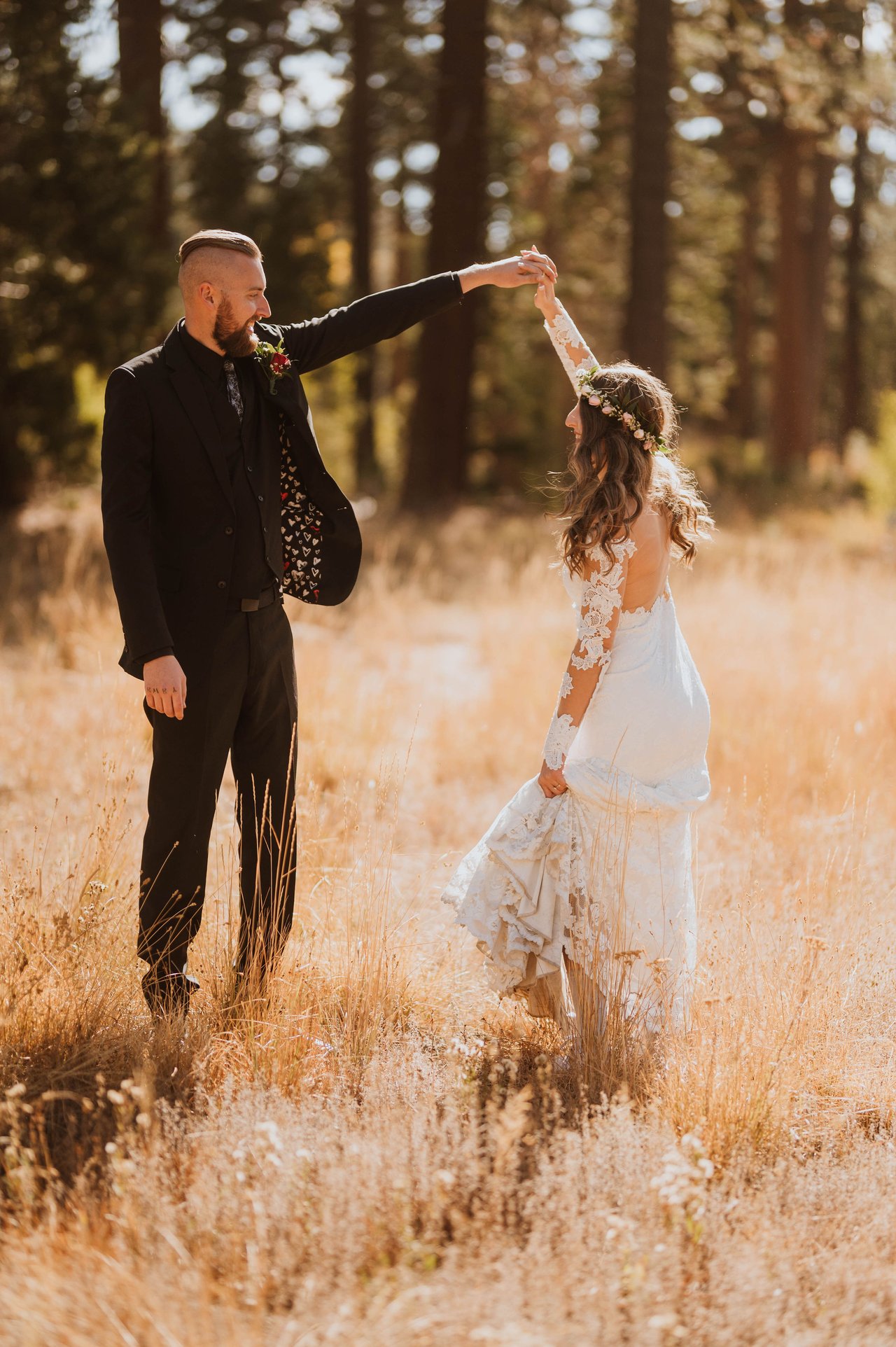 Christopher twirls Rachel in the meadow
