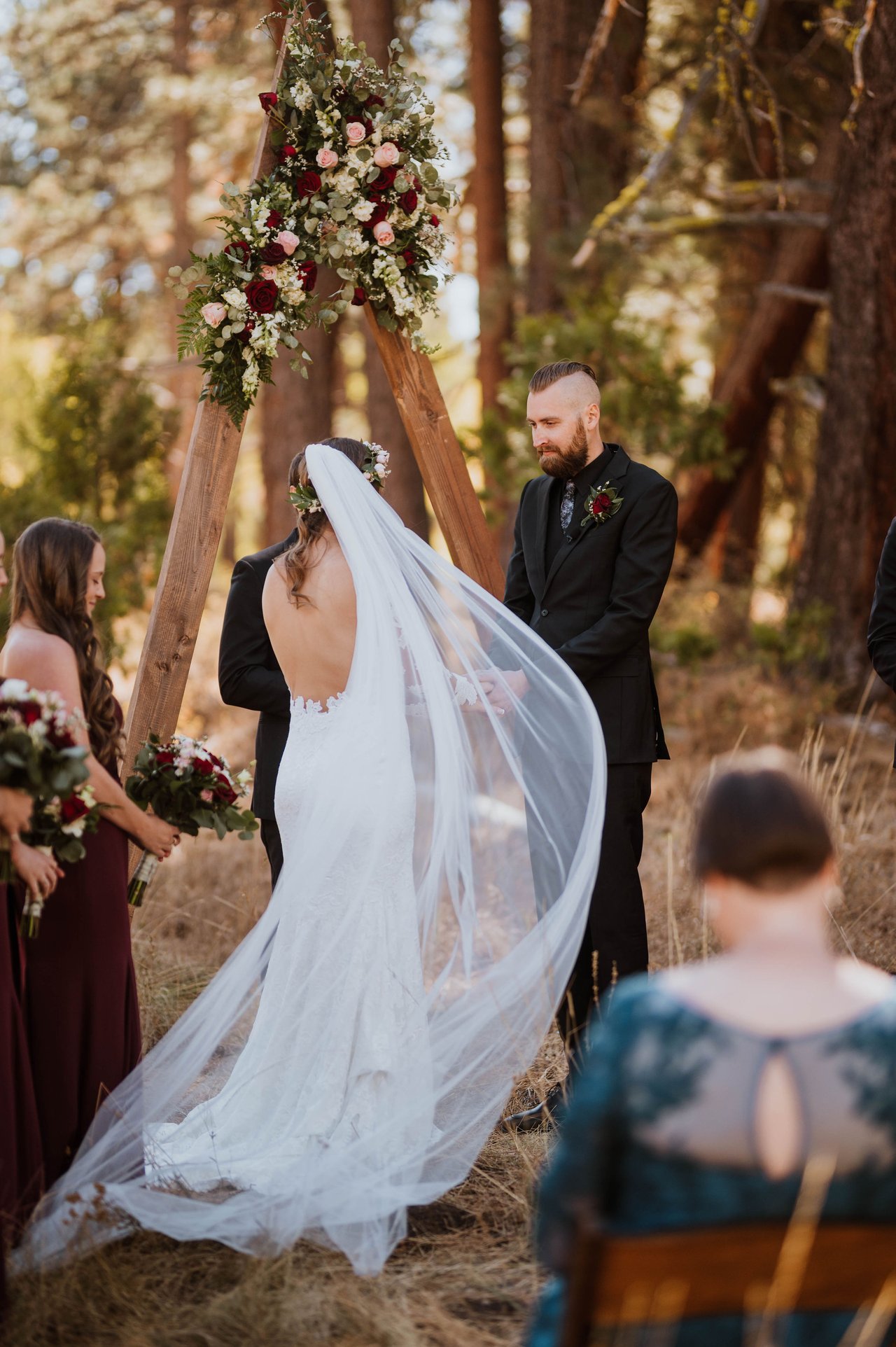 Rachel's veil catches the light at the arch