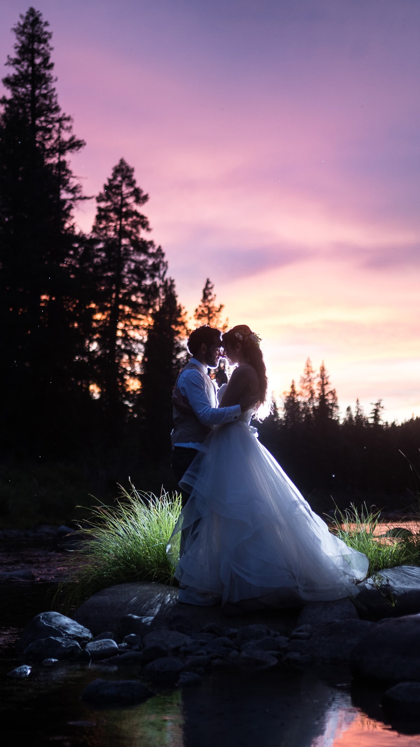 Shannon & Ryan Figueroa at sunset on the river at Twenty Mile House in Graeagle, California