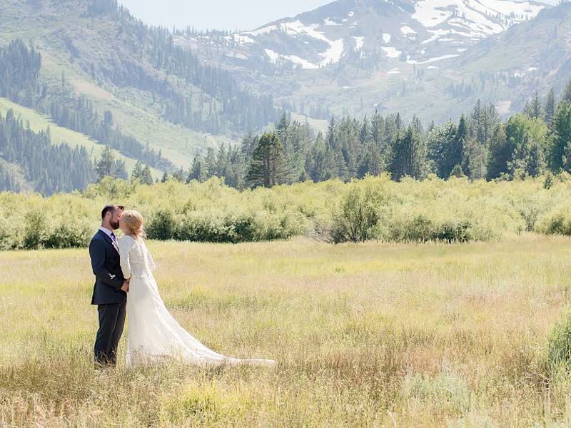 A couple in the mountain meadow at Everline Resort near Truckee